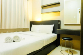 Pleasant 2BR Apartment at Green Pramuka City near Mall By Travelio